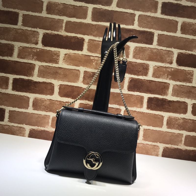 G*u*i top handle bags